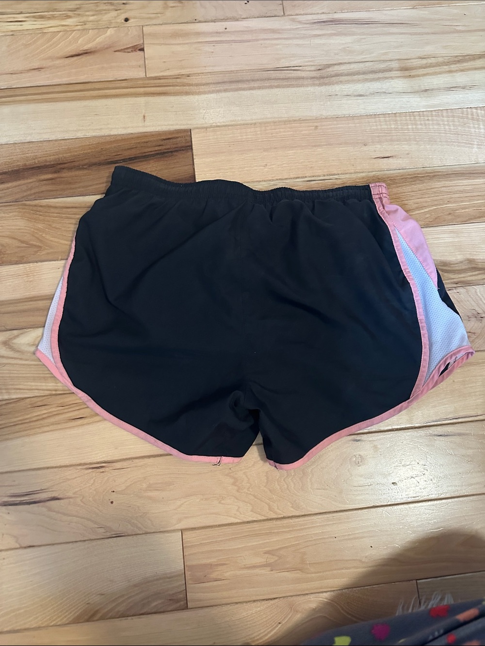 Nike dry-fit Black Shorts with Pink Trim and White Swoosh - Picture 2 of 3